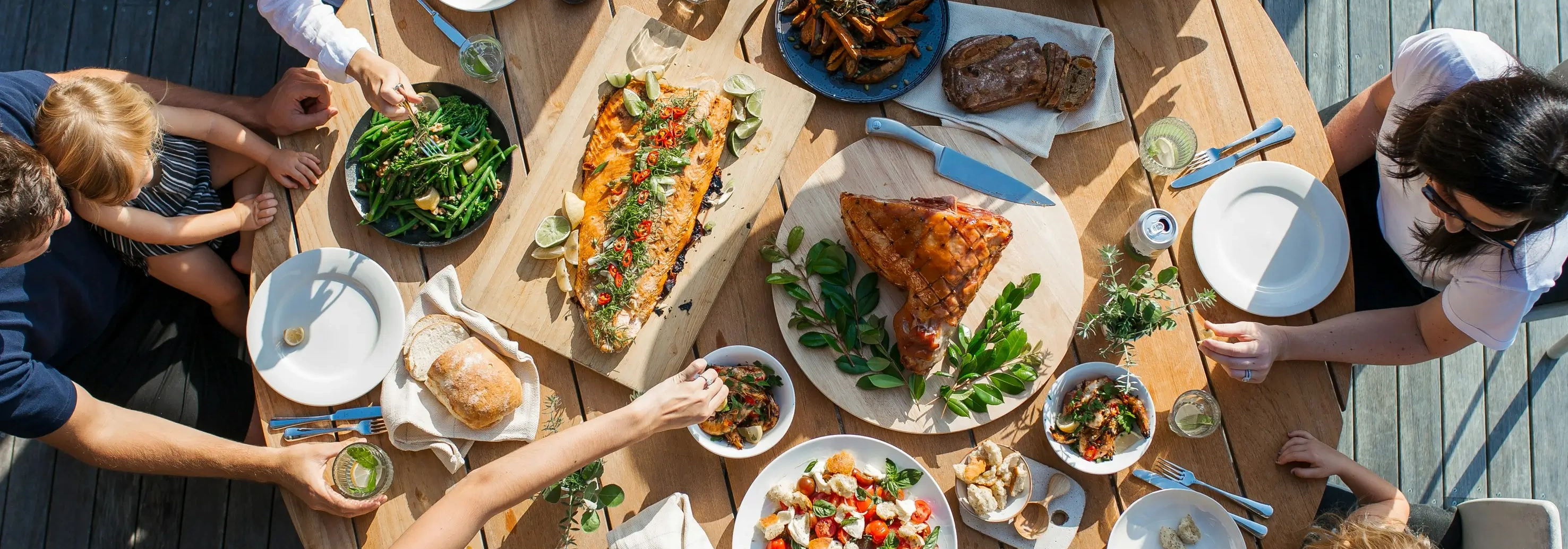 People having lunch around a round table